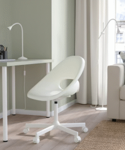 White chair in home office with desk and window