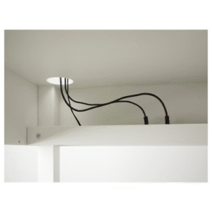 IKEA MICKE corner workstation with cable management hole – top view of cord routing feature in white finish