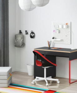 Red and black MICKE desk setup in a modern kids’ room