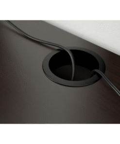 Cable outlet on black-brown MICKE desk keeps cords neat