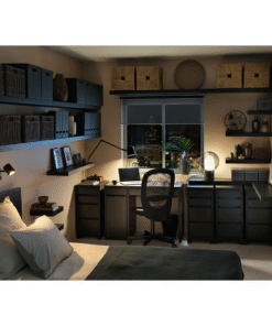 Black-brown desk and drawers in a modern bedroom setup at night