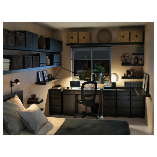 Black-brown desk and drawers in a modern bedroom setup at night