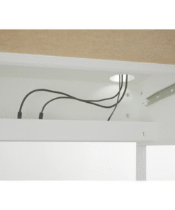 Cable routing system hidden behind drawer in white MICKE desk