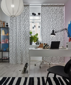 White MICKE desk in modern bedroom with daylight curtains and accessories