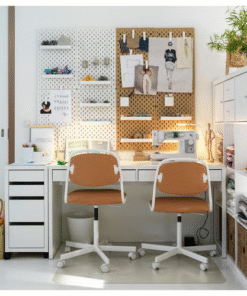 MICKE desks with white chairs and pegboard organizers above