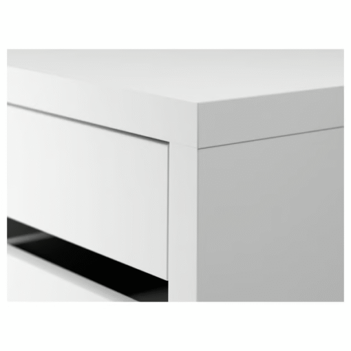 Close-up of IKEA MICKE drawer unit showing clean lines and white finish